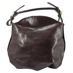 Brown leather shoulder bag with curved top handles and adjustable shoulder strap