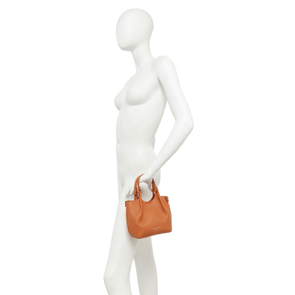Mini hobo bag worn on mannequin: silver textured leather with short top handles