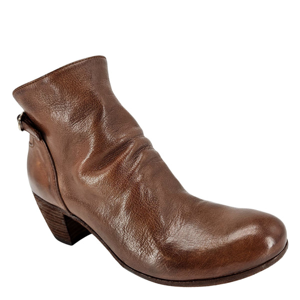 Cognac leather ankle boot with side zipper and low block heel, angled view