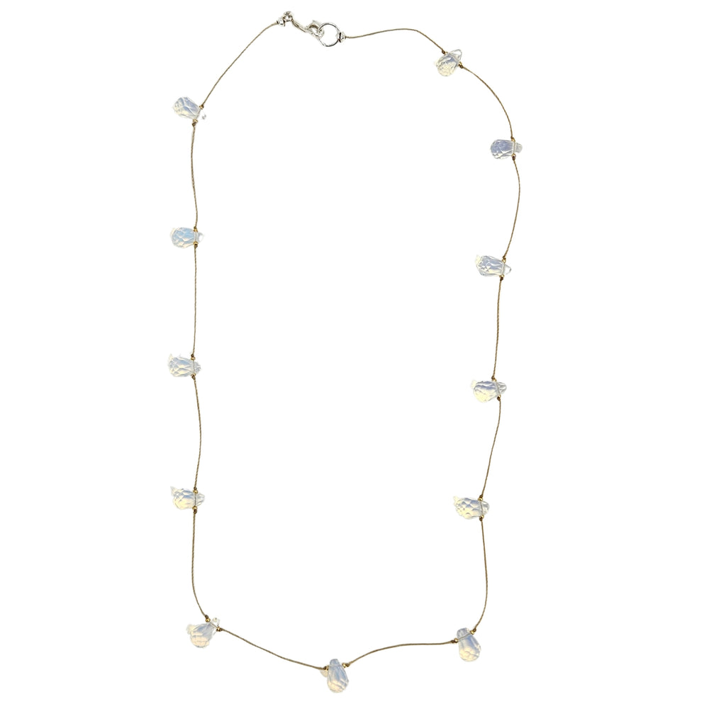 Teardrop gemstone station necklace with pale white teardrop charms on thin chain