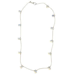 Teardrop gemstone station necklace with pale white teardrop charms on thin chain