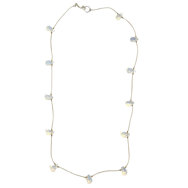 Teardrop gemstone station necklace with pale white teardrop charms on thin chain