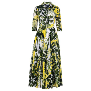 Women's long-sleeve maxi dress with white, yellow, and green leaf print, button front