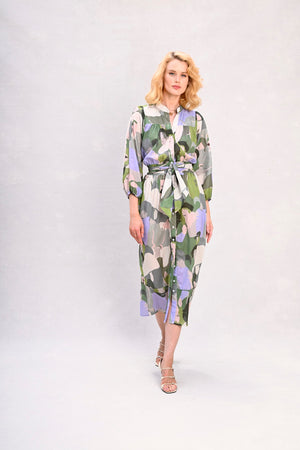 Green and lavender abstract face print midi dress with belt, long sleeves, front pose