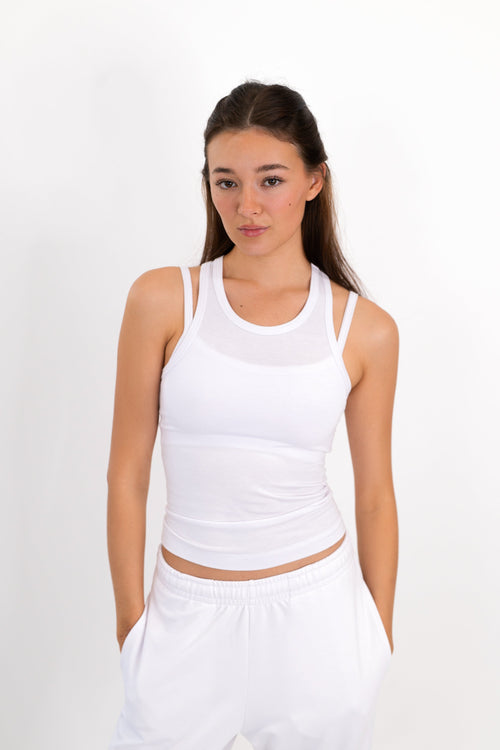 White scoop-neck tank with ruched waist and racerback straps