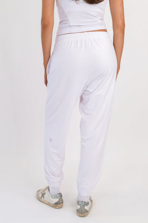 White sweatpants, full length view, elastic waist with tapered ankle cuffs