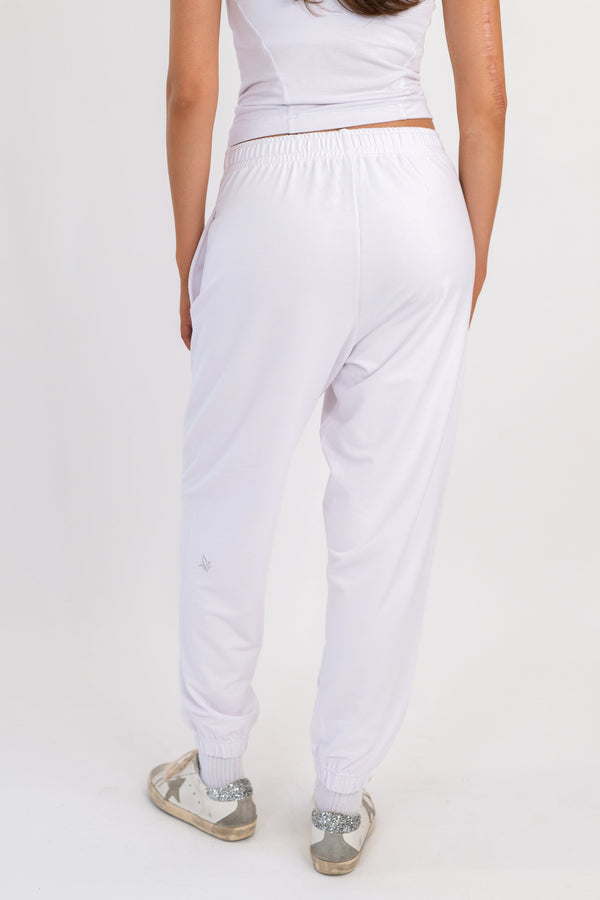 White sweatpants, full length view, elastic waist with tapered ankle cuffs