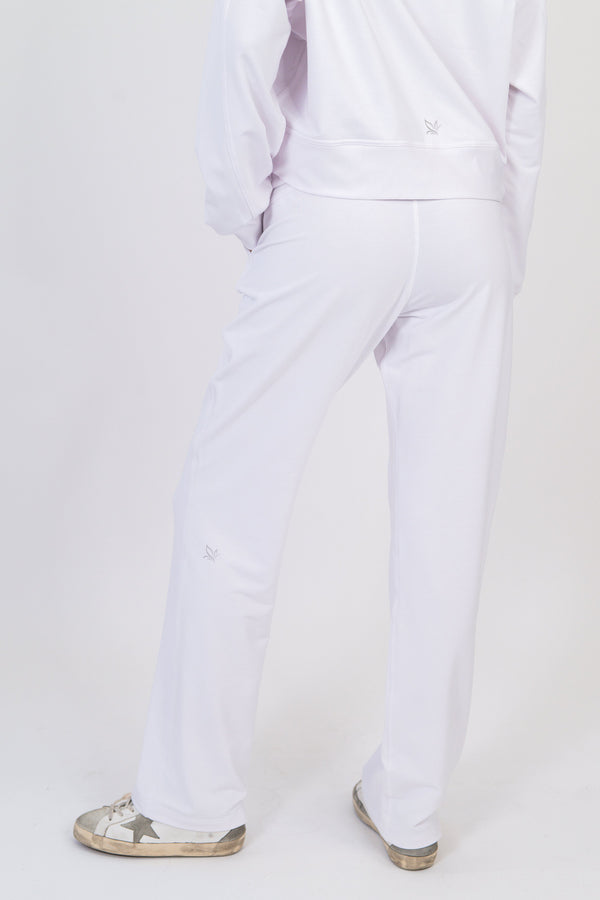White wide-leg sweatpants with drawstring waist and ankle-length relaxed fit