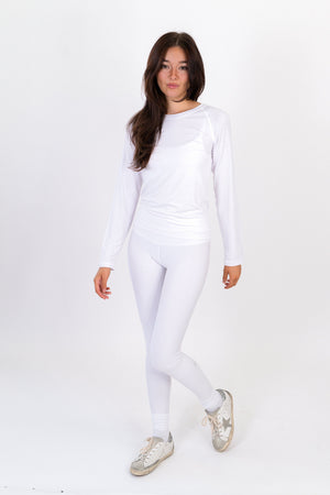 White long-sleeve fitted crewneck shirt with straight hem and close fit.