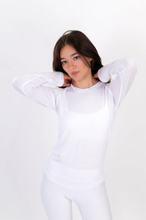 White long-sleeve fitted crewneck shirt with subtle stitching.