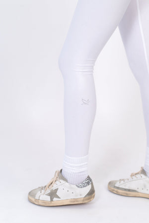 White leggings with small ankle logo, ribbed cuffs, slim compression fit