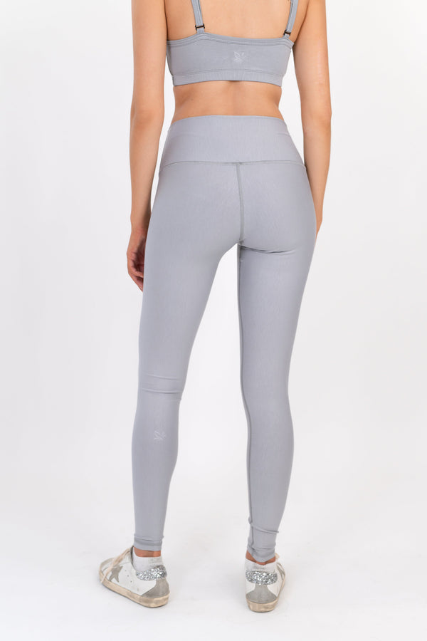 Light gray leggings, back view full length with smooth seam lines.