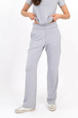 Light gray wide-leg sweatpants, relaxed fit with cuffed hems