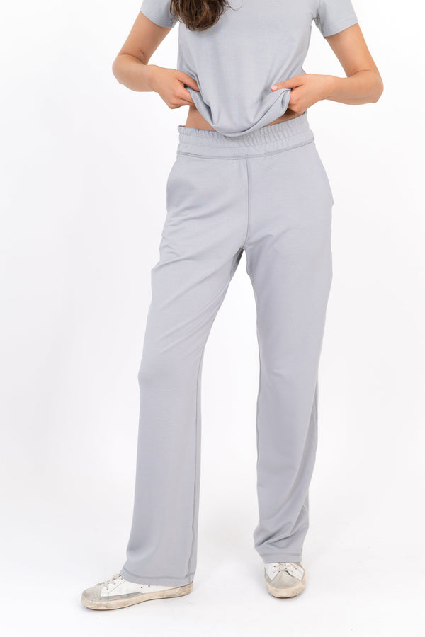 Light gray wide-leg sweatpants, relaxed fit with cuffed hems