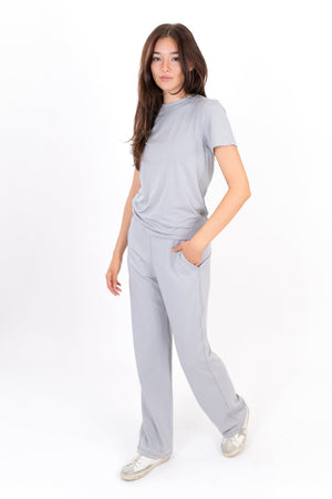 Gray wide-leg sweatpants with elastic waistband and side pockets