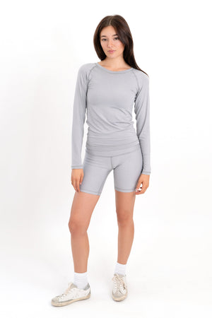 Gray 5-inch core shorts with smooth fabric and subtle logo on left leg.