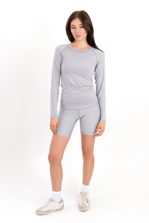 Gray 5-inch core shorts with smooth fabric and subtle logo on left leg.