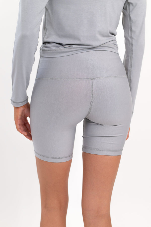 Gray 5-inch core shorts with stitched front seam and fitted, stretchy look.