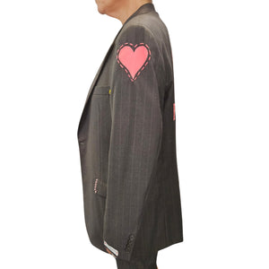 Charcoal pinstripe blazer with pink heart embroidery on the sleeve