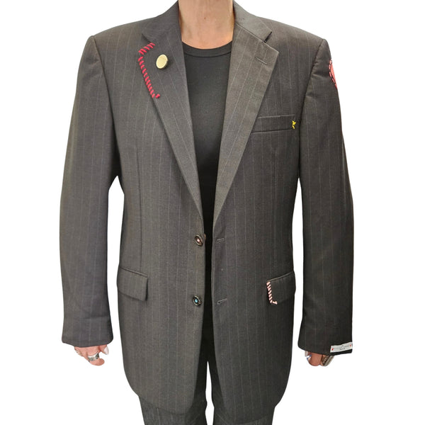 Charcoal pinstripe single-breasted blazer with notch lapels and colorful stitch details