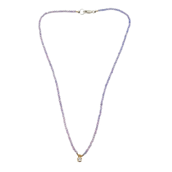 Lavender amethyst choker with faceted beads and round gold-tone charm at center