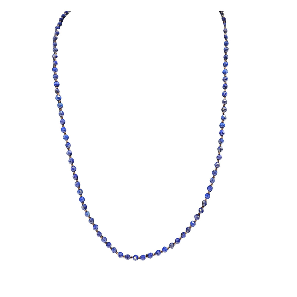 Blue faceted lapis bead necklace with small round beads and gold-tone spacers