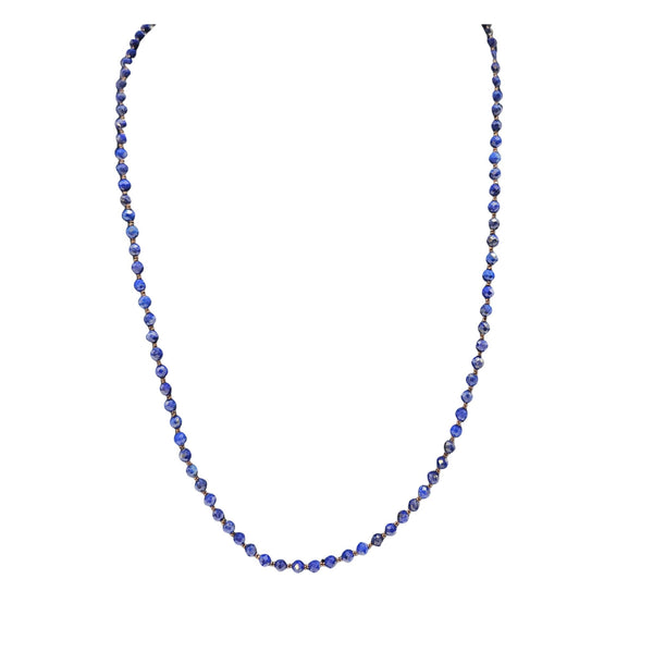 Blue faceted lapis bead necklace with small round beads and gold-tone spacers