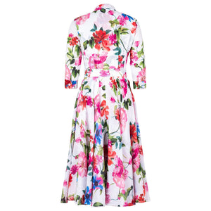 Floral midi dress with belted waist and long sleeves, white base with large pink red blooms