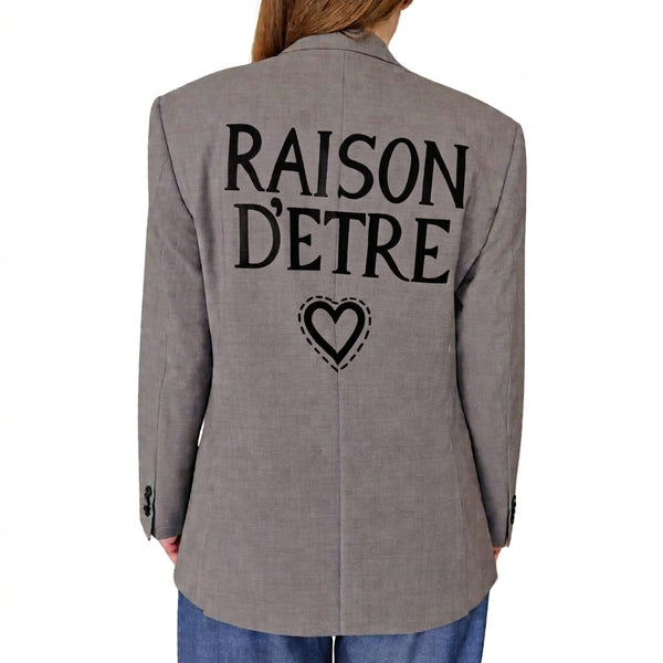 Grey blazer back with large "RAISON D'ETRE" text and heart outline graphic