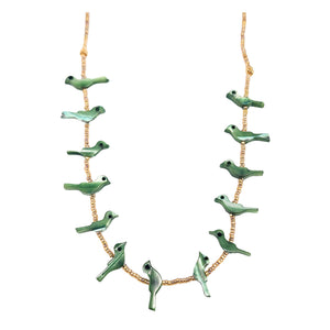 Gold-tone necklace chain with dangling green bird charms and beaded links