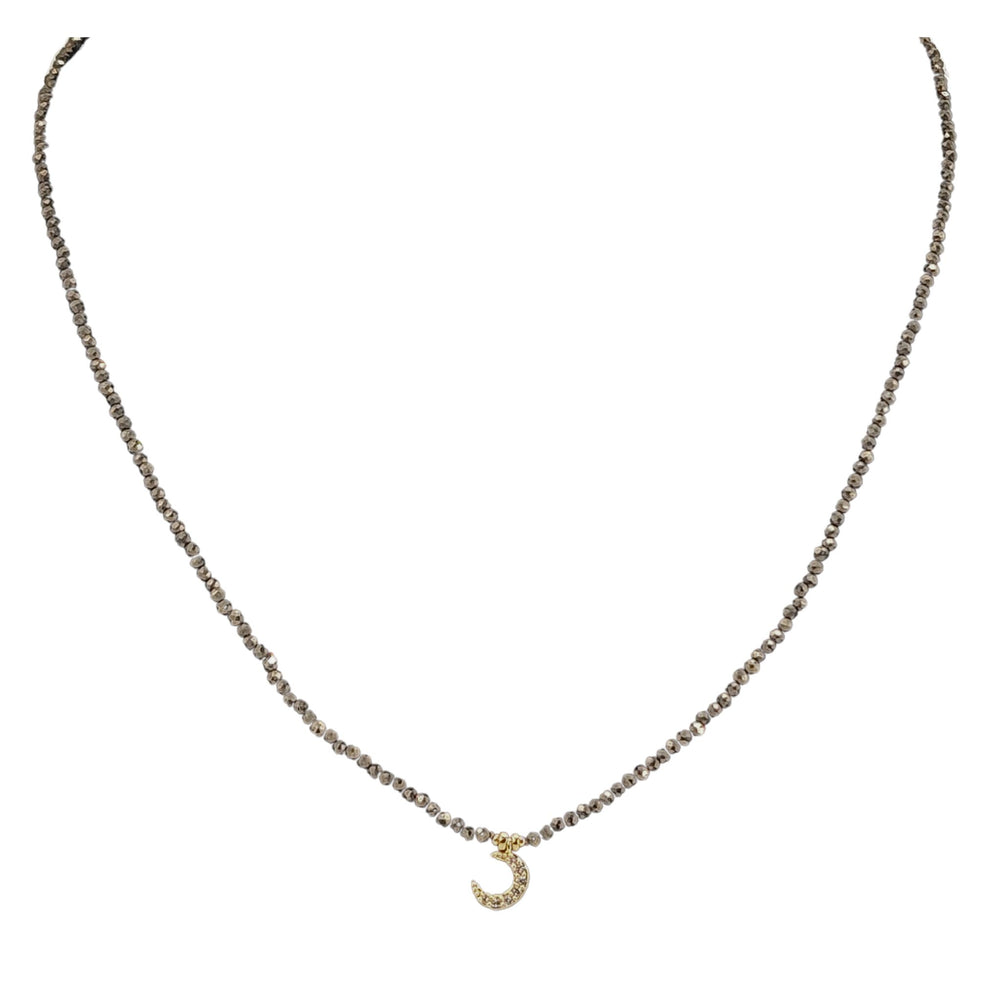 Black hematite micro-bead choker with gold moon pendant and crystal detail