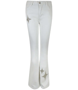 Light wash denim jeans with gold glitter star patches