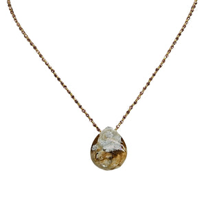 Beige jasper pendant necklace with thin gold-tone chain and teardrop pendant