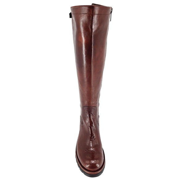 Brown leather tall flat boot with glossy finish and low block heel.