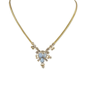Gold-tone chain necklace with blue cabochon rhinestone cluster pendant