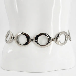 Silvertone chain belt with five large round ring links, shown on a mannequin bust