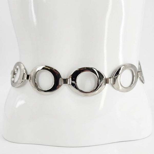 Silvertone chain belt with five large round ring links, shown on a mannequin bust