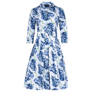 Back view lilac floral midi dress with long sleeves and gathered waist