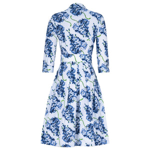 Lilac floral midi dress with long sleeves, high neckline, and gathered waist