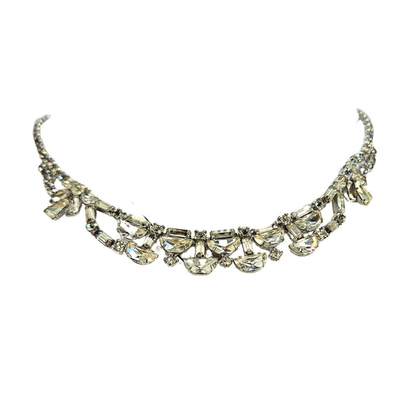 Silver rhinestone necklace with scalloped teardrop center rows and ribbon bow accents