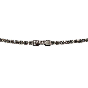 Silver rhinestone necklace clasp detail with rectangular closure and sparkling border