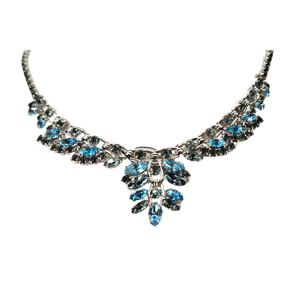 Vintage silvertone rhinestone necklace with blue-green stones and floral drop pendant