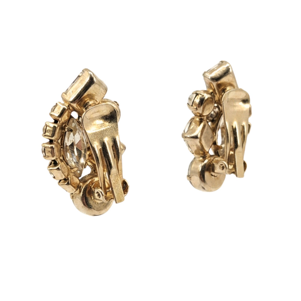 Gold-tone clip earrings with five opalescent oval stones and multicolor rhinestone cluster