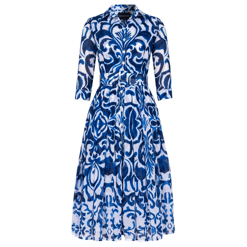 Long-sleeve midi dress in blue-and-white tile print with button front and fitted waist