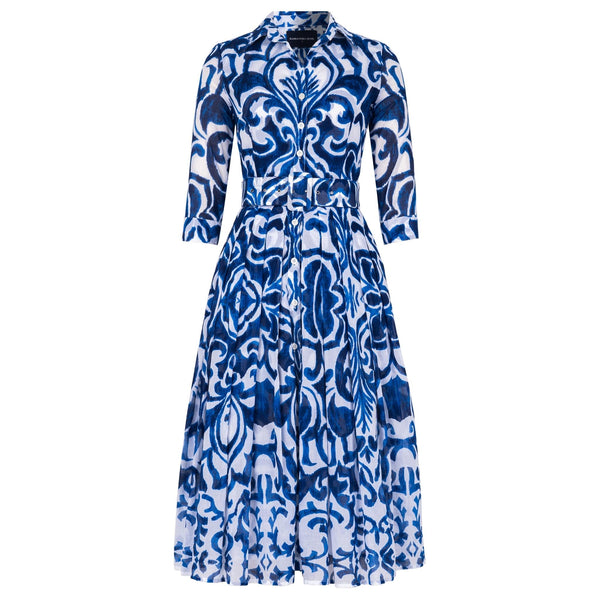 Long-sleeve midi dress in blue-and-white tile print with button front and fitted waist