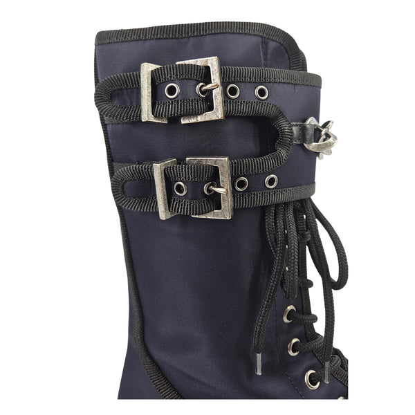 Navy boot upper with two buckled straps, metal hardware, lace-up eyelets