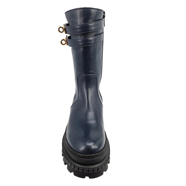 Navy shearling-lined platform boots back view with stacked buckle straps on the shaft