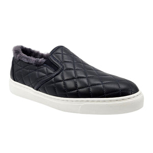Quilted leather slip-on sneaker with gray shearling lining, white rubber sole, navy