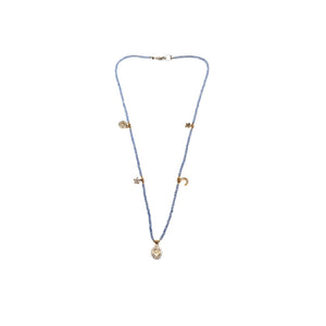 Pale violet blue charm necklace with multiple gold-toned charms and flower pendant