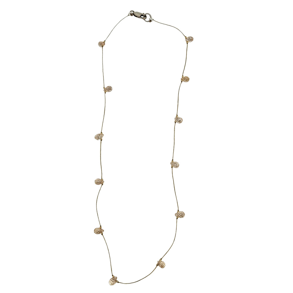 Peach teardrop gemstone station necklace with faceted beads on thin gold chain